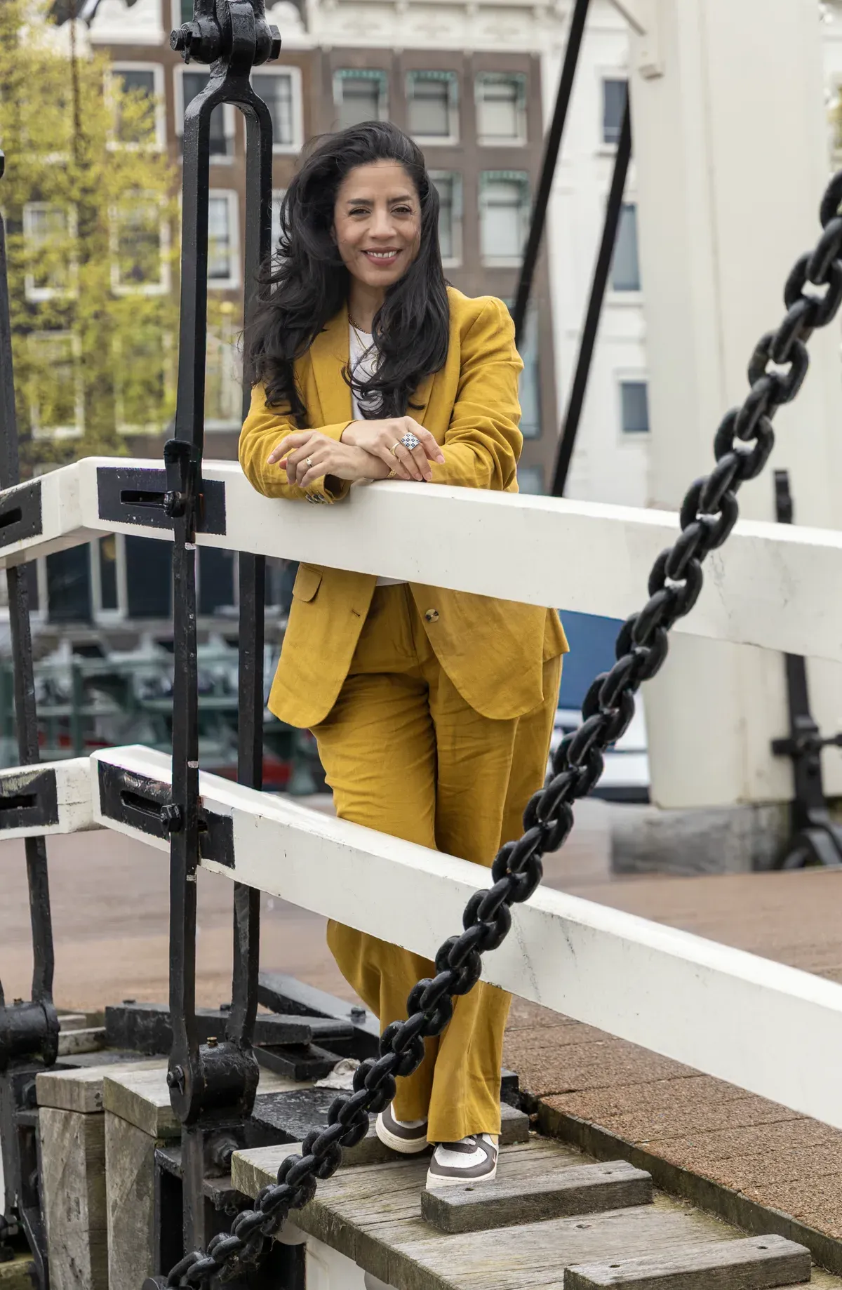 Adriana standing on a canal bridge