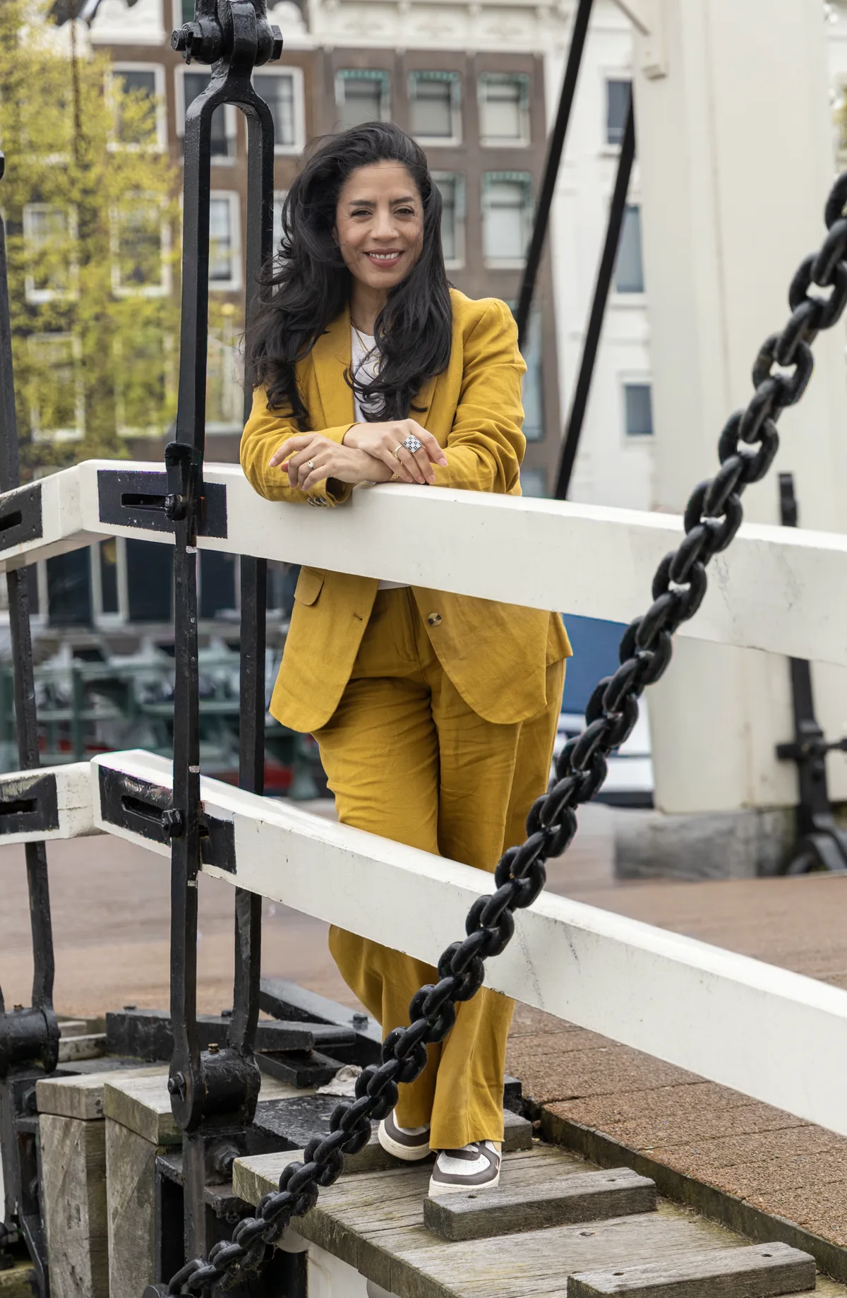 Adriana standing on a canal bridge